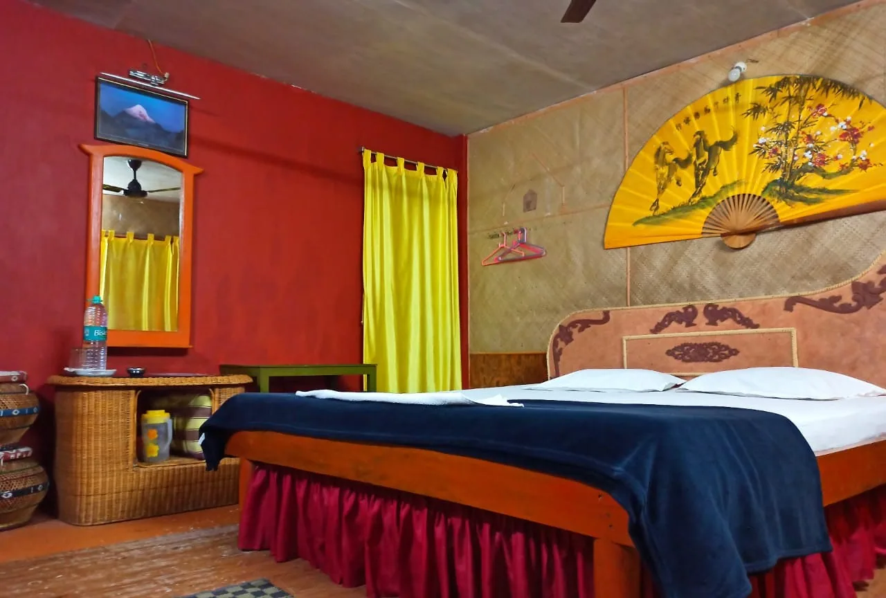 Executive cottage room interior at Tajpur Retreat